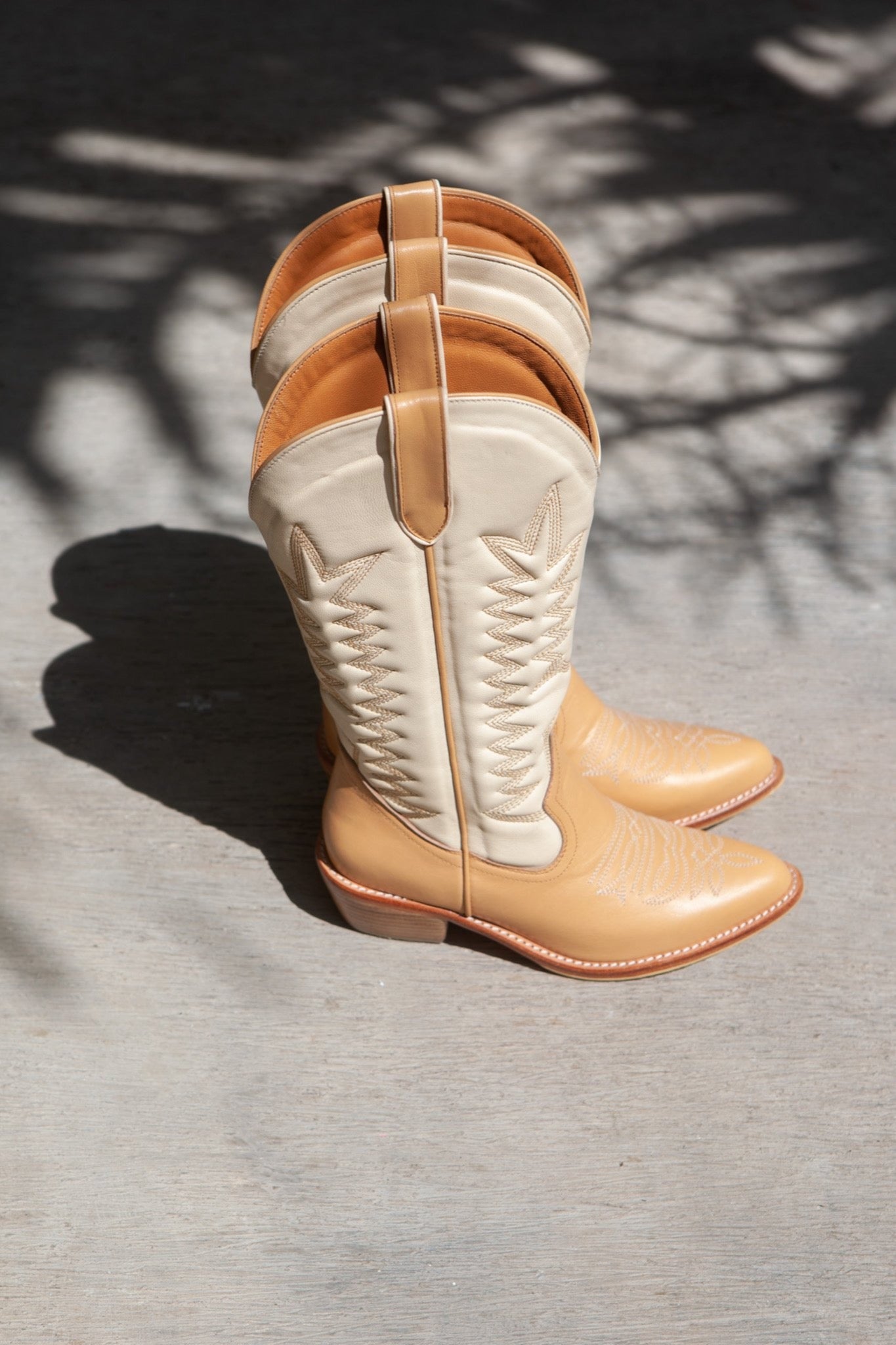 balm wears cowboy boot date shake